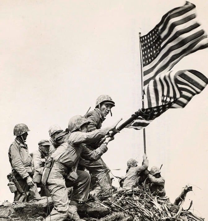 US Marines raising the flag on Mount Suribachi, Iwo Jima, February 1945
