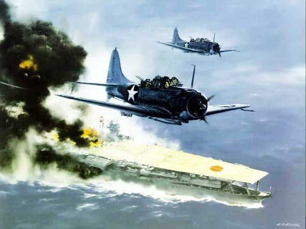 Dauntless dive bombers attacking a burning Japanese carrier