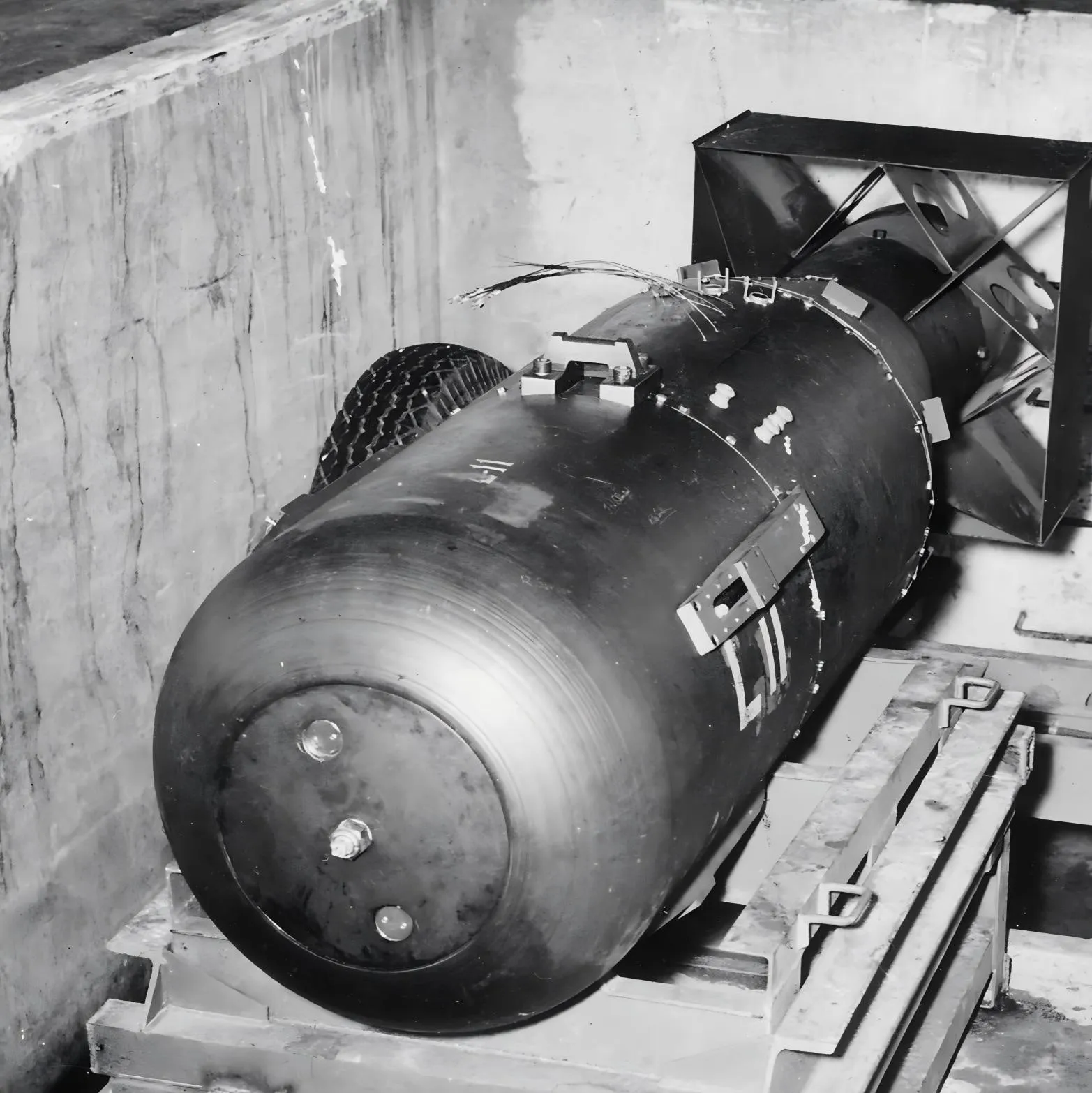 The 10-feet long Little Boy waiting to be loaded into the bomb bay of the B-29 Superfortress 'Enola Gay' on the Pacific island of Tinian.