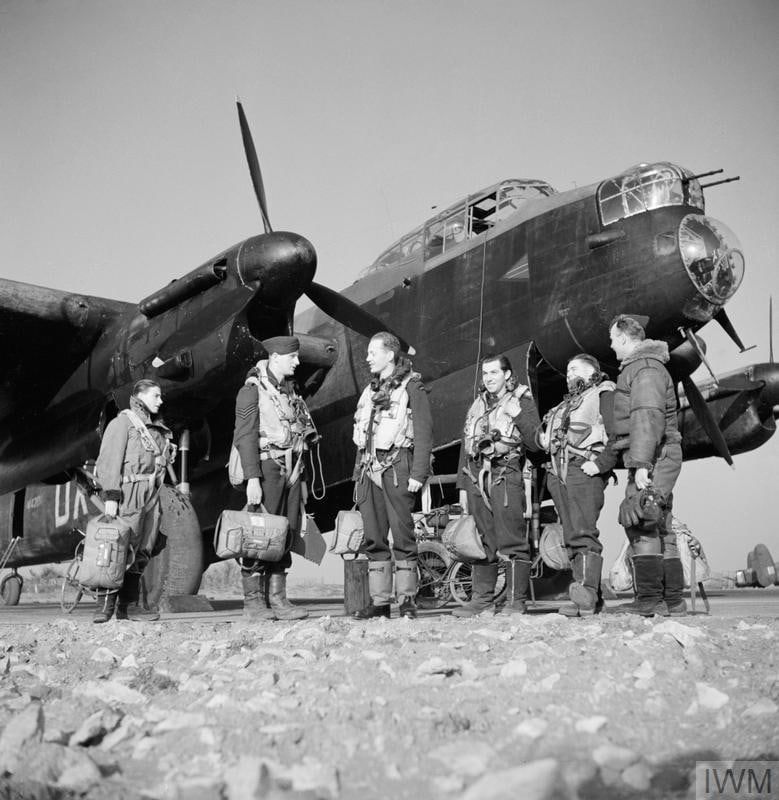 An RAF bomber crew beside their aircraft, Second World War